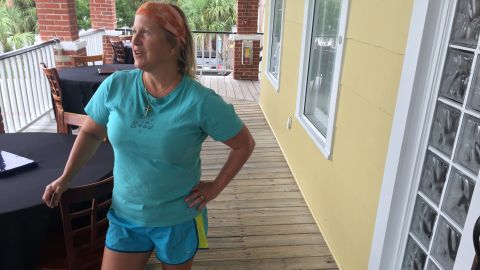 Karen Kelly, who runs a bed and breakfast in Tybee Island, Georgia, said she plans to stay put so she can help people if the storm hits.