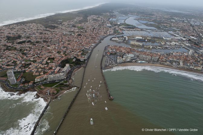 The winner of the last edition, Francois Gabart, sails into the harbor to finish after 78 days -- a new race record.