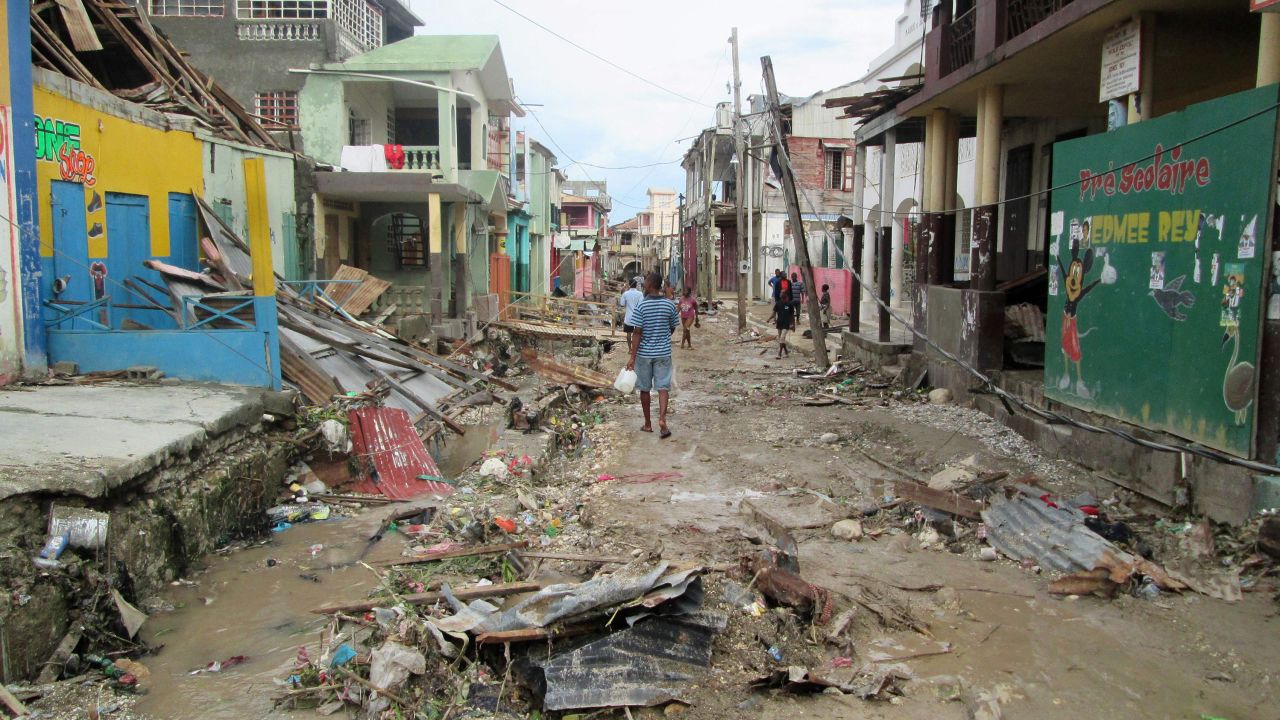 A man walks through the devastated town of Jeremie in west Haiti.