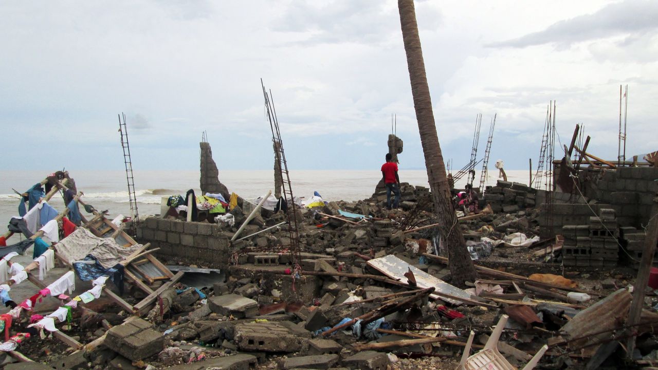 A man walks through the devastated town of Jeremie, west Haiti.