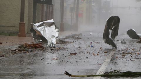 Debris flies across the street in Daytona Beach.