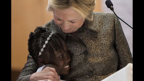 Democratic presidential candidate Hillary Clinton hugs Zianna Oliphant on stage <a href="http://www.cnn.com/2016/10/02/politics/hillary-clinton-zianna-oliphant-keith-lamont-scott-charlotte/" target="_blank">after speaking at a church</a> in Charlotte, North Carolina, on Sunday, October 2. Zianna, 9, garnered national attention when she tearfully spoke at a Charlotte City Council meeting about recent police killings of African-Americans. Clinton told the congregation she "wouldn't be able to stand it" if her own grandchildren ever felt the kind of fear and worry that Oliphant and others have expressed. 