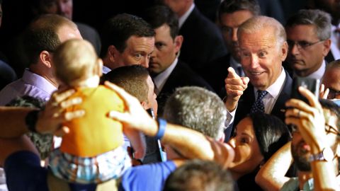 Vice President Joe Biden points at an 8-month-old boy during a Hillary Clinton rally in Orlando on Monday, October 3.