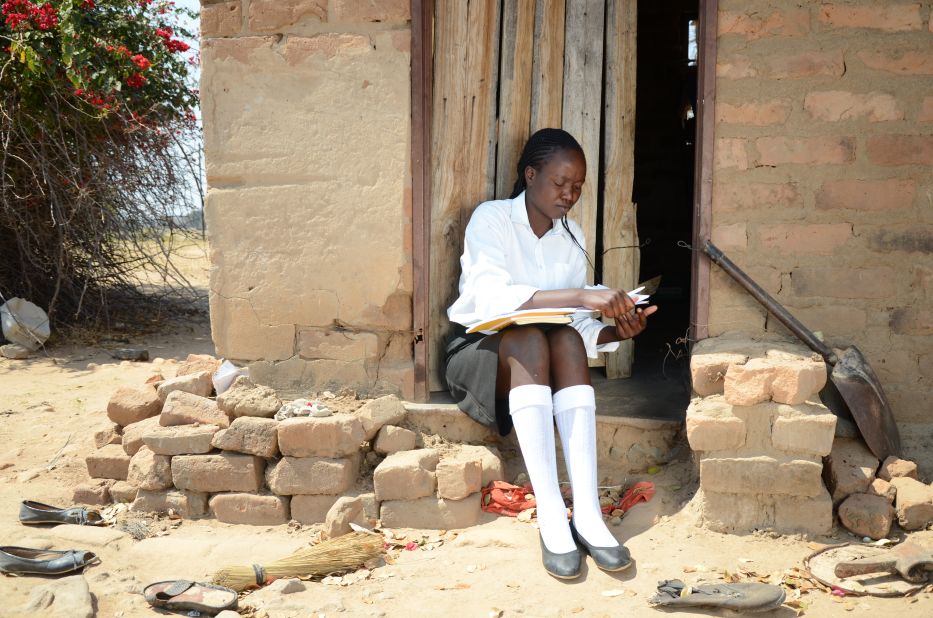 Siphethangani, 18, pictured, finished secondary (high) school with flying colors and is now doing her A-Levels (college exams). "I love school because that's the foundation of a good life," she tells the researchers. But life looks very different for some girls. From poverty to child marriage, there are an array of reasons why many young Zimbabwean women drop out of school. These are their stories, as told to Plan International. <br />