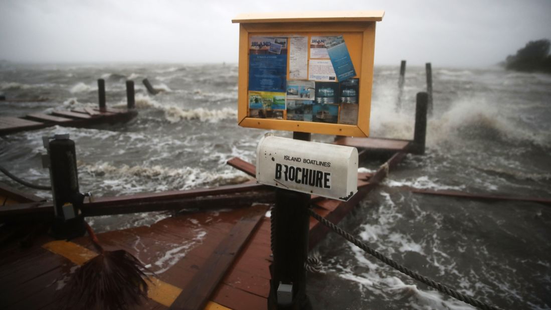 Heavy waves pound boat docks in Cocoa Beach, Florida, on October 7.