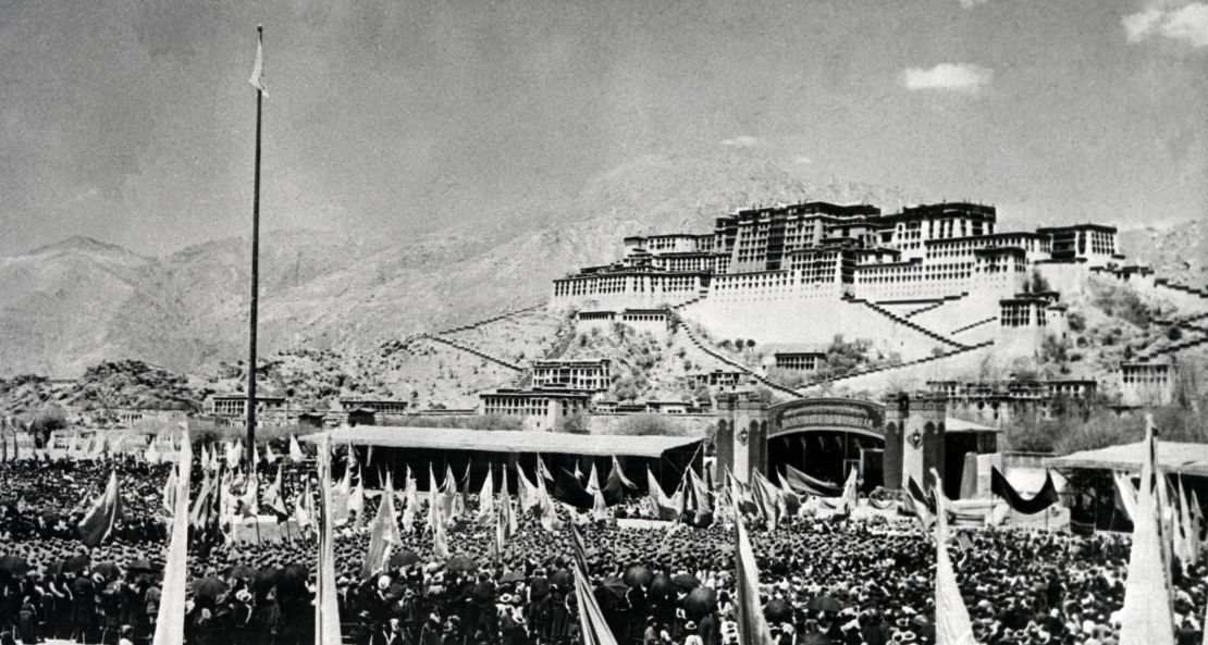 Tibetans gather during the armed uprising against Chinese rule on March 10, 1959, in front of the Potala Palace, the former home of the Dalai Lama, in Lhasa, the capital of Tibet.
