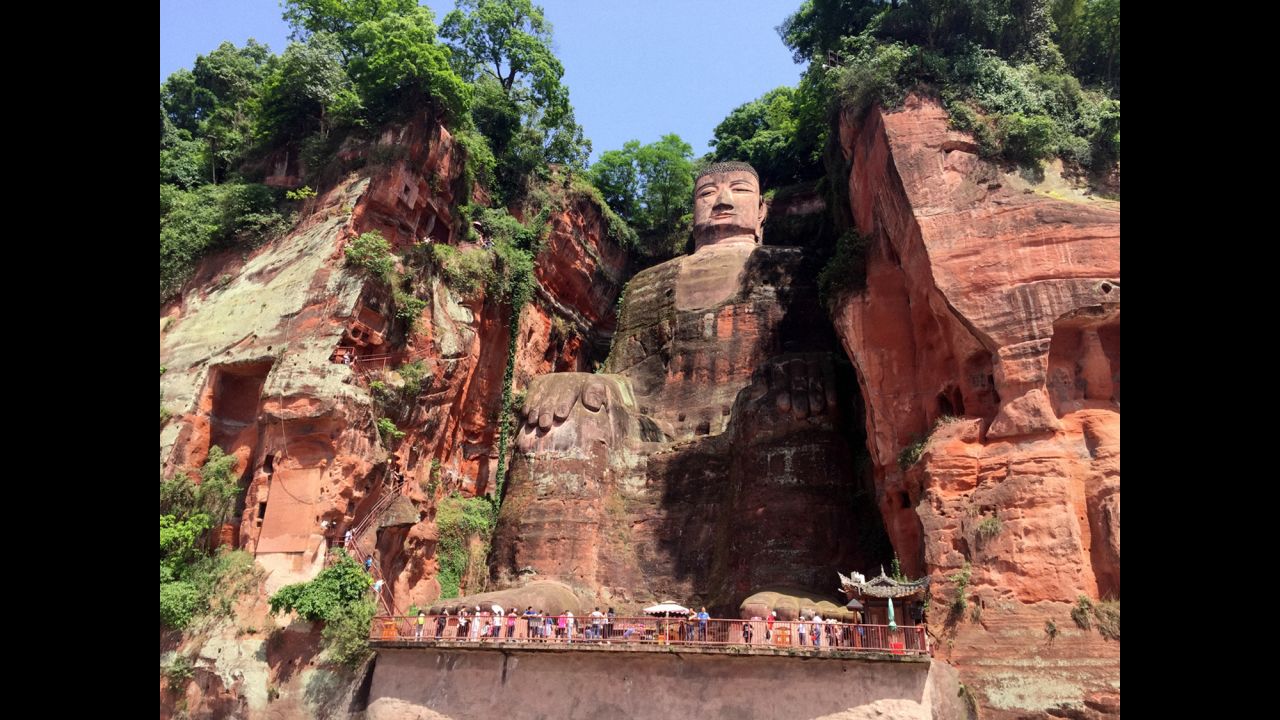 They traveled about two hours south of Chengdu to see the Giant Buddha in Leshan. Carving started in 713 A.D. on what is still the largest stone Buddha in the world.