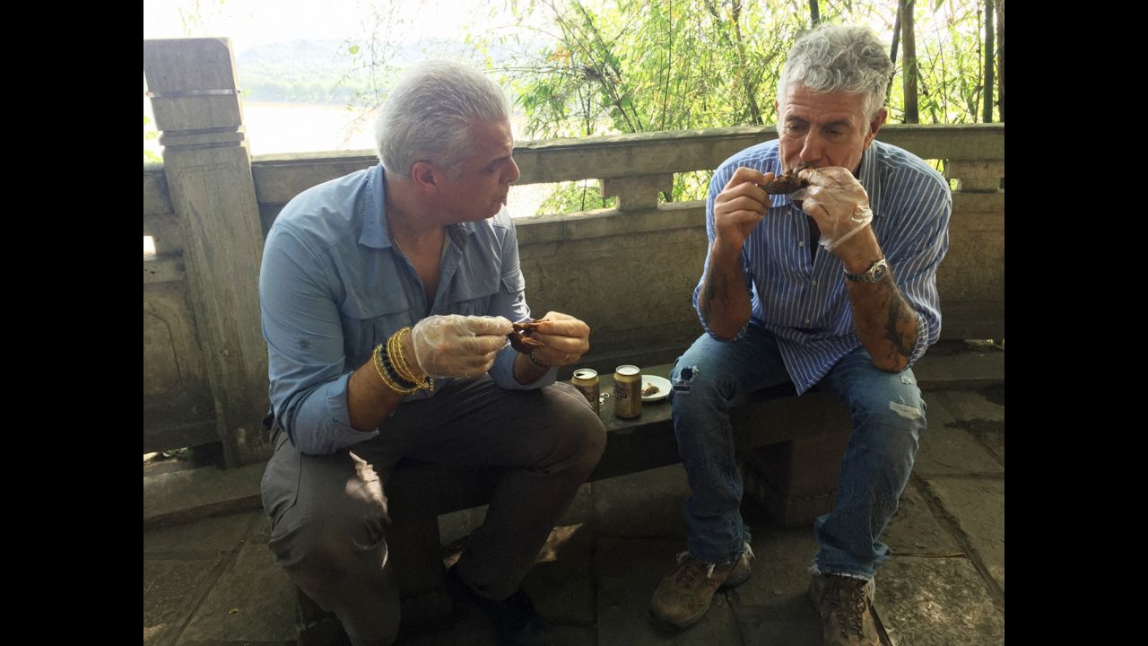 During the excursion to see the Buddha, Ripert and Bourdain stopped for a local snack -- rabbit head.