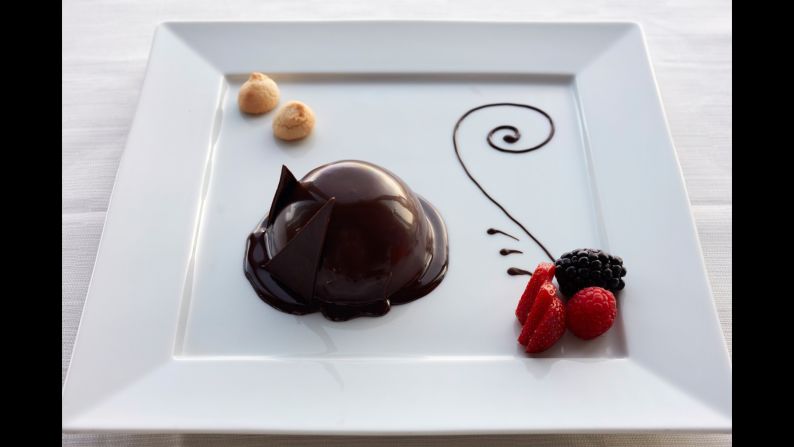 With desserts like this semifreddo di zabaione con crema al cioccolato e rum, it's no wonder that Oceania Cruises won for best luxury dining. 