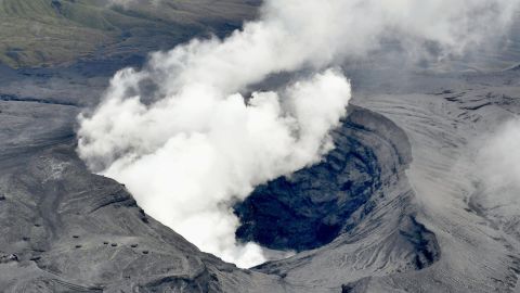 Japan's Mount Aso volcano sends a plume of ash into the air.
