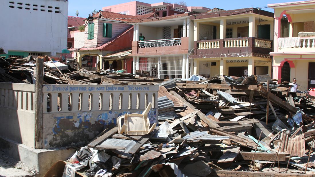 Rubble lies in the street in the aftermath of the storm.