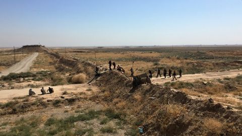 The Kurdish front line near Daqouq, Iraq. Every day dozens of people fleeing ISIS-controlled territory brave bombs and booby-traps to get here. In the last month, nine have been killed trying to reach Daqouq.