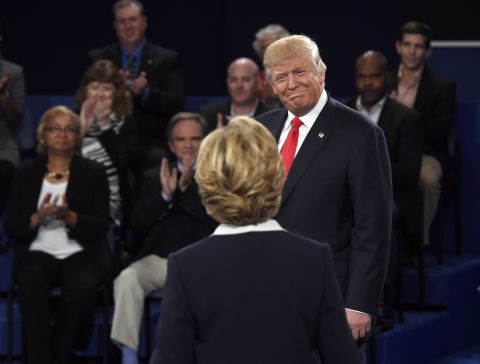 Trump greets Clinton before the start of the debate.