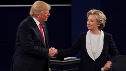 ST LOUIS, MO - OCTOBER 09:  Republican presidential nominee Donald Trump shakes hands with Democratic presidential nominee former Secretary of State Hillary Clinton during the town hall debate at Washington University on October 9, 2016 in St Louis, Missouri. This is the second of three presidential debates scheduled prior to the November 8th election.  (Photo by Chip Somodevilla/Getty Images)