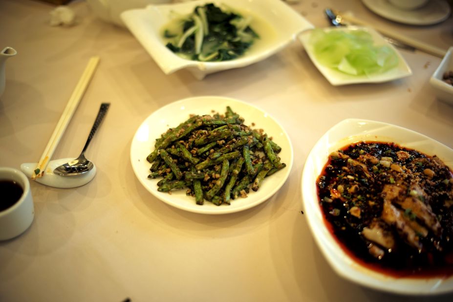 <strong>Seasonal greens: </strong>Dry-fried green beans, a signature dish often made with Sichuan peppercorns, garlic, ginger, scallions, mustard root and ground pork, has a delightful burst of flavors.