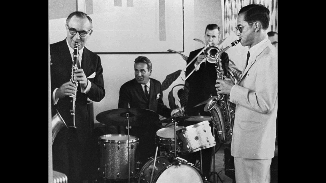 The King, far right, plays the saxophone during a 1960 jam session with legendary jazz clarinetist Benny Goodman and his band in New York.