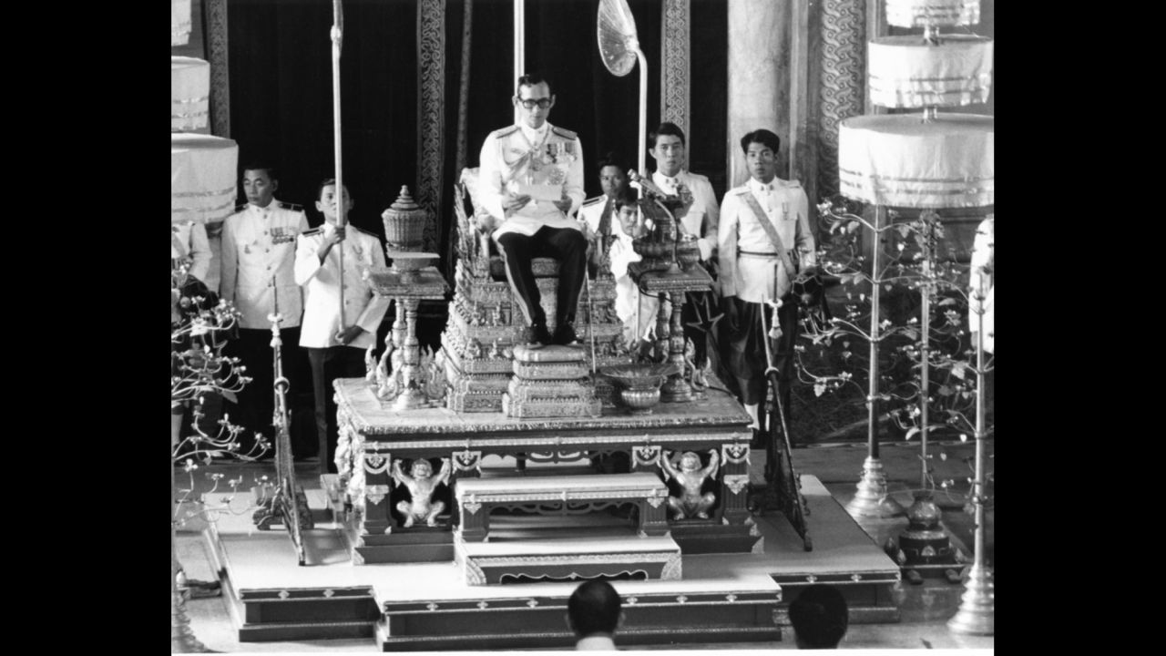 The King convenes the first meeting of his country's National Reform Assembly during a ceremony held in Bangkok in 1976. The King put the monarchy at the center of Thai society, acting as a force for community and tradition even as the country flipped between political crises and military coups.