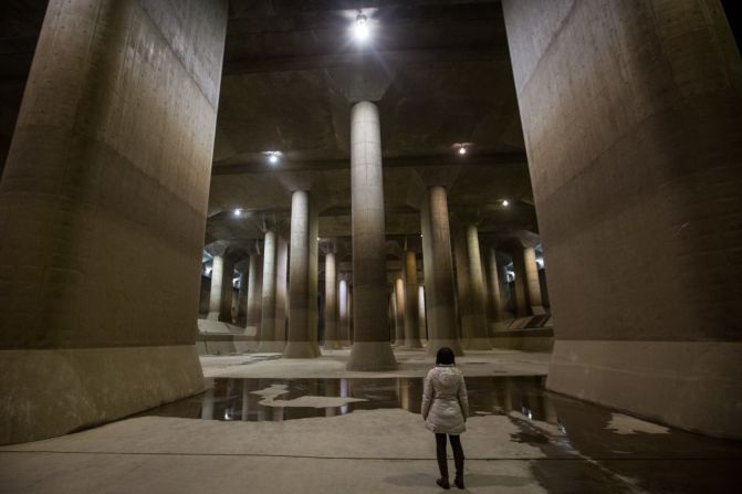 Constructed 72 feet below ground, the gigantic pressure-adjusting water tank in Tokyo looks like a concrete cathedral. 580 feet long, 256 feet wide, 59 feet high and featuring 59 pillars weighing 500 tons each, the facility took 13 years to build. Designed to take water overflow from four rivers, redirect it underground into a 4 mile tunnel before pumping it out into the Edo River, the channel is used an average of seven times a year, when heavy storms and typhoons hit the metropolitan area. When it's not preventing Tokyo from flooding, there's tours three times a day.