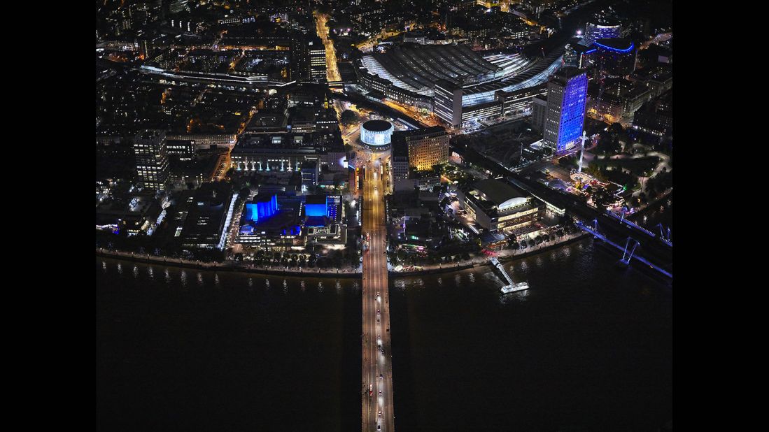 "You lean out, vertically shoot down, and that gets this unique angle," Lieber tells CNN. This shot captures Waterloo Bridge as it leads up to the BFI IMAX cinema. Festival Pier is on the right. 