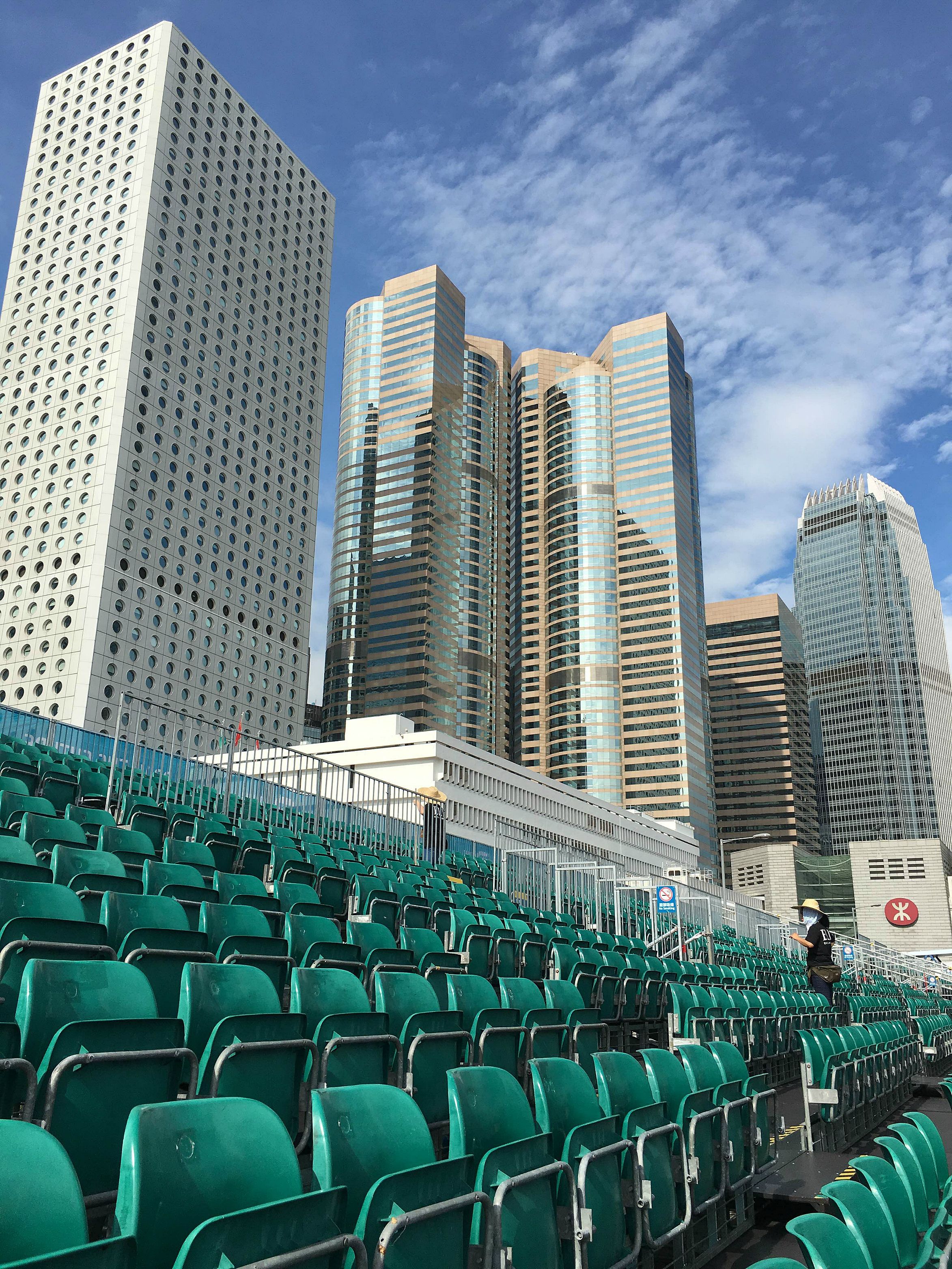 Cleaners prepare the grandstands on Sunday morning ahead of the Hong Kong race.