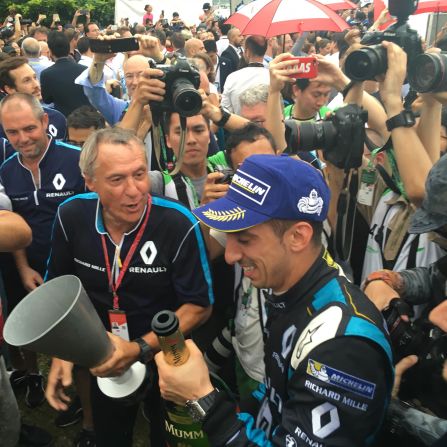 Race winner Sebastien Buemi savors victory after taking the checkered flag at the first Hong Kong ePrix.