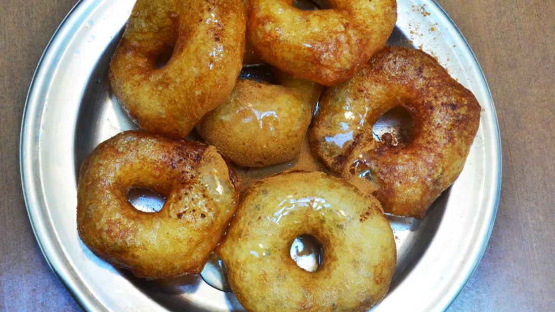 Loukoumades, fried dough balls in honey and cinnamon, are as unique to Greece as the Parthenon. Straight from the pan, they're delicate, fluffy and fragrant.<br />