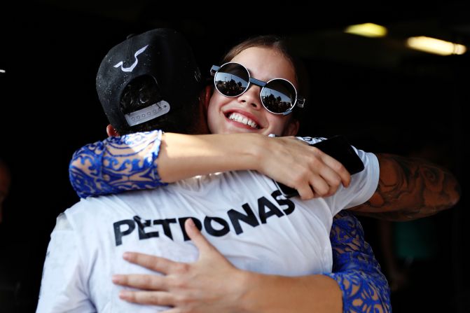 Hamilton earns a hug from Hungarian model Barbara Palvin as he takes the lead in the world championship for the first time in 2016 <a href="index.php?page=&url=http%3A%2F%2Fcnn.com%2F2016%2F07%2F24%2Fmotorsport%2Fhungarian-grand-prix-lewis-hamilton%2F" target="_blank">thanks to a win in Budapest. </a>The British driver moved into a six-point lead over Rosberg, who finished second.