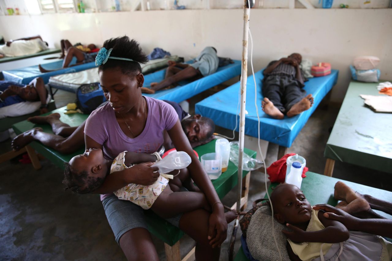 People sick with cholera receive medical assistance at a hospital in Jeremie on October 10. The destruction from Matthew has accelerated the cholera epidemic in Haiti and undermined strides made in fighting the waterborne disease, the country's leader says.