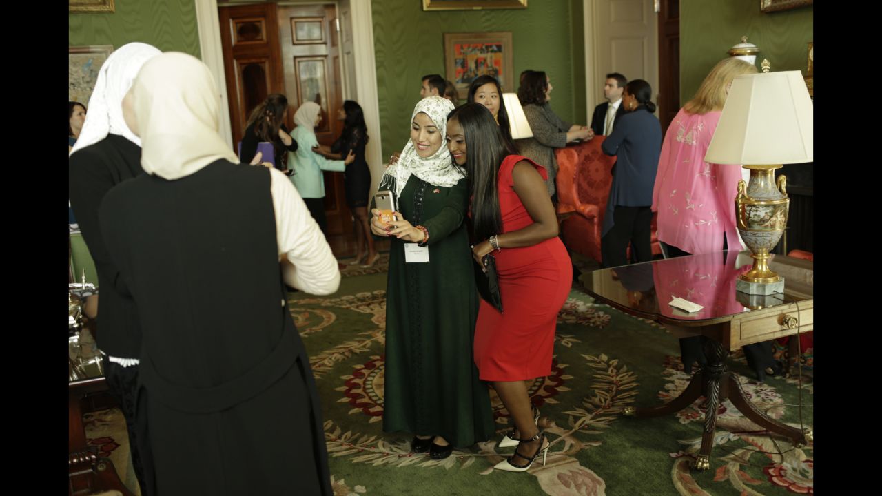 CNN's Isha Sesay, seen here in red taking a photo in the White House's Green Room, also traveled to Liberia and Morocco with Obama and <a href="http://www.cnn.com/2016/10/10/opinions/cnn-films-we-will-rise-freida-pinto/index.html" target="_blank">actress Freida Pinto</a>. 