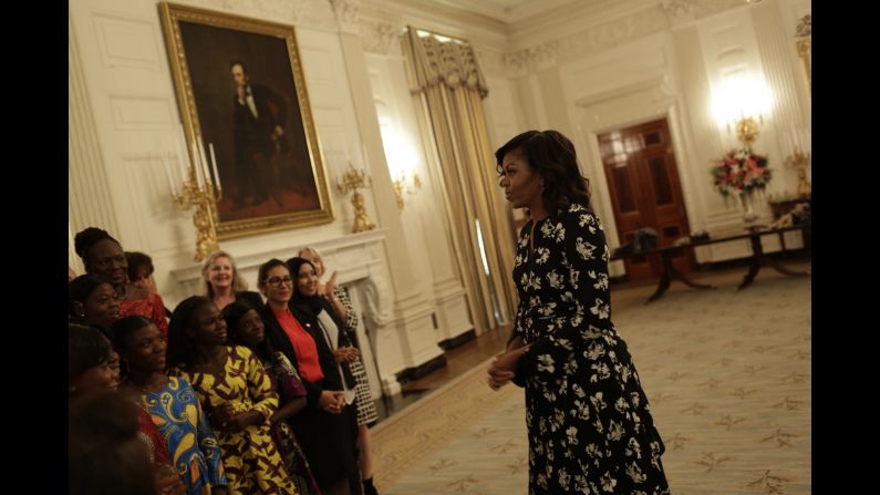 As part of her effort to make an impact on global girls' education, Obama, seen here speaking to a group in the State Dining Room, <a href="index.php?page=&url=http%3A%2F%2Fwww.cnn.com%2F2016%2F07%2F01%2Fopinions%2Fafrica-trip-michelle-obama%2Findex.html" target="_blank">launched an initiative called Let Girls Learn</a>. The program has partnered "with some of the world's largest companies and organizations that are committing money, resources and expertise" to girls' education, Obama wrote in her opinion piece. 