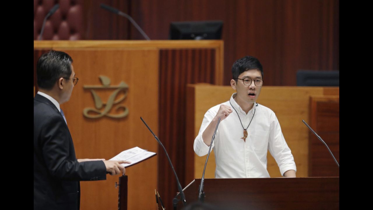 Nathan Law, the city's youngest lawmaker, quoted Ghandi before making his oath. He also refused to leave the podium demanding that the Legislative Council secretary general, Kenneth Chen, explain his reasons for refusing to accept the oaths of his fellow lawmakers.