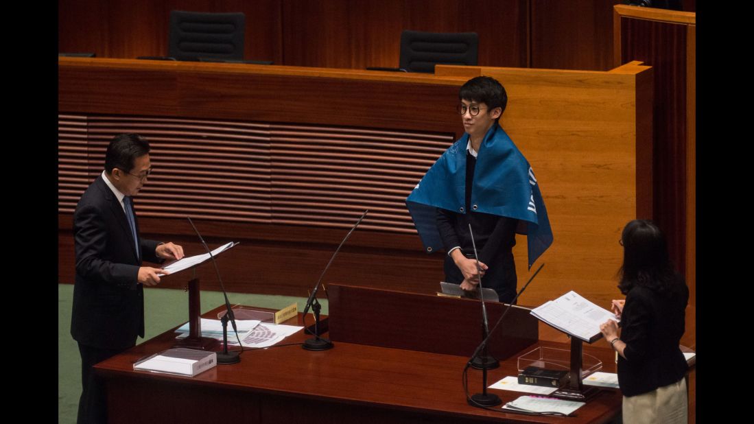 Lawmakers not only displayed flags declaring that Hong Kong is not a part of China but also called out for "democratic self-determination" for the semi-autonomous Chinese city at Wednesday's oath taking session.