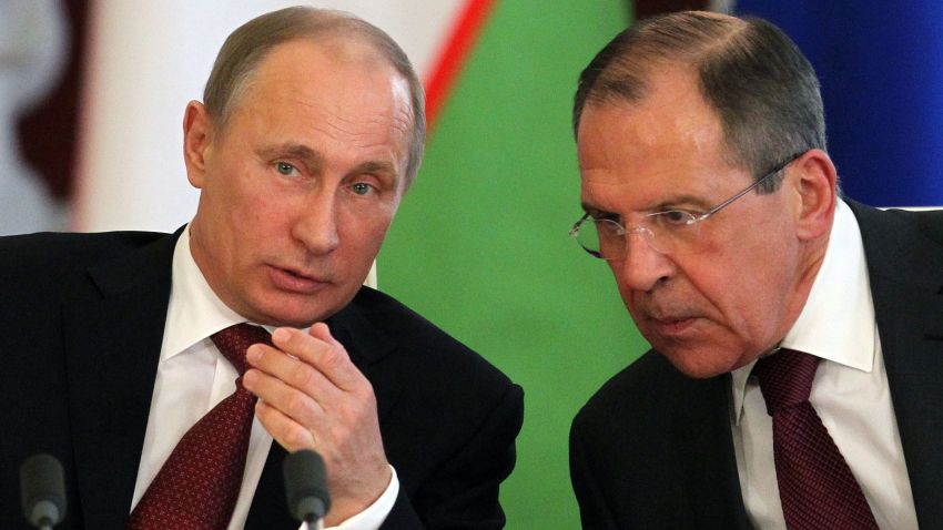 MOSCOW, RUSSIA - APRIL 15: Russian President Vladimir Putin (L) talks to talks to Foreign Minister Sergey Lavrov during a meeting with Uzbekistan President Islam Karimov in the Kremlin on April 15, 2013 in in Moscow, Russia. Karimov is on a state visit to Russia. (Photo by Sasha Mordovets/Getty Images)