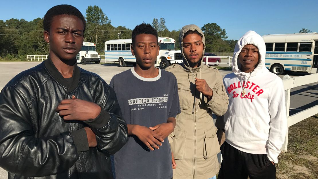 From left: Jaylane Sinclair, Davontae McBryde, Louis Rodriguez and Kashon Priest. They helped rescue their neighbors as the floodwaters from Hurricane Matthew surrounded their apartment complex. 
