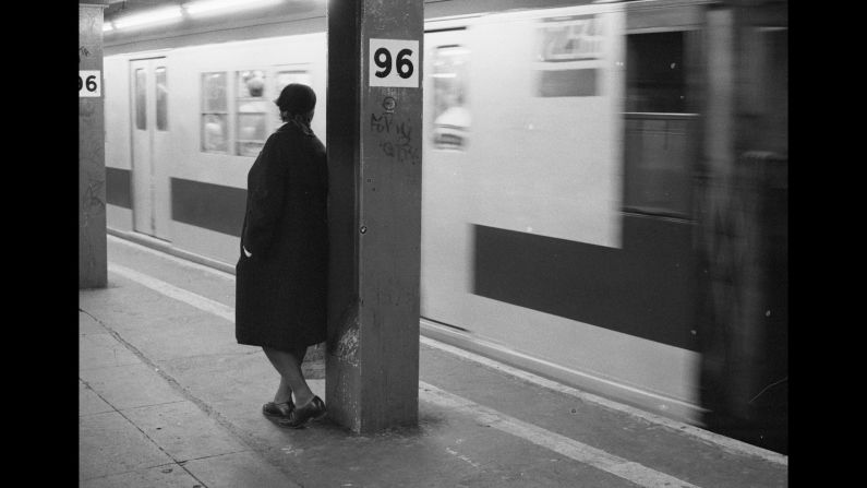 A person waits for the subway at 96th Street Station in 1981. "I guess I took it because it was a rare shot of a clean train with no graffiti," Conzo said. "It was very rare in those days to see an actual clean train. We used to call them the white ghosts. I can guarantee you that by the end of the night that train had graffiti on it."