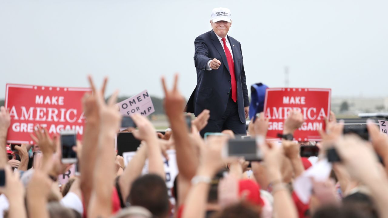 Donald Trump acknowledges supporters at the conclusion of his campaign rally in Lakeland, Florida on October 12, 2016.