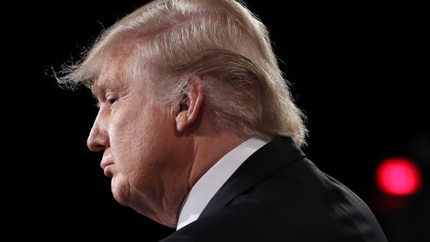 Republican nominee Donald Trump is seen during the first presidential debate at Hofstra University in Hempstead, New York on September 26, 2016.
Hillary Clinton and Donald Trump face off in one of the most consequential presidential debates in modern US history with up to 100 million viewers set to tune in. / AFP / POOL / joe raedle        (Photo credit should read JOE RAEDLE/AFP/Getty Images)