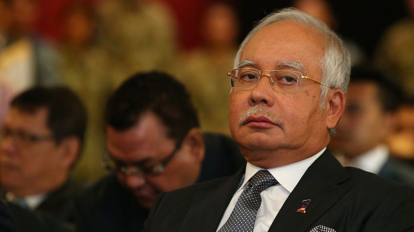 PERTH, AUSTRALIA - APRIL 03:  Malaysian Prime Minister Najib Razak looks on as Air Chief Marshall Angus Houston commence his briefing about the search mission for the missing Malaysia Airlines flight MH370 at RAAF base Pearce on April 3, 2014 in Perth, Australia. The search continues off the Western Australian coast for Malaysia Airlines flight MH370 that vanished on March 8 with 239 passengers and crew on board. The flight is suspected to have crashed into the southern Indian Ocean with no survivors.  (Photo by Paul Kane/Getty Images)