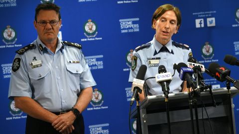 New South Wales Police Commissioner Catherine Burn, right, addresses the media after two 16-year-old boys were charged with terror-related offences in Sydney on October 13, 2016.