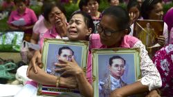 Supporters of Thailand's King Bhumibol Adulyadej react as they pray at Siriraj Hospital, where the king is being treated, in Bangkok on October 13, 2016.
Well-wishers kept up their vigil outside a Bangkok hospital on October 13, offering prayers for ailing King Bhumibol Adulyadej as Thailand faces the prospect of losing its figure of unity in a deeply polarized nation. / AFP / MUNIR UZ ZAMAN        (Photo credit should read MUNIR UZ ZAMAN/AFP/Getty Images)