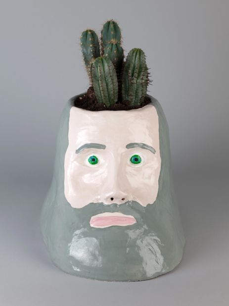 "The Philosopher" (2008), painted ceramic and cacti.<br />