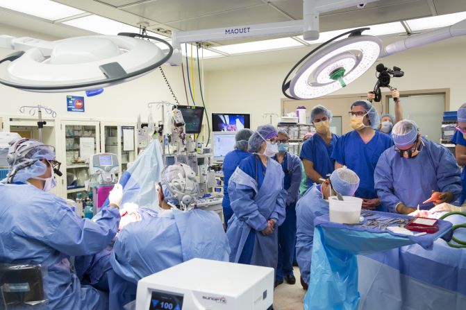 Newly separated twins Anias, left, and Jadon in surgery at the hospital. Goodrich informed the family of the successful separation at about 3 a.m. October 14. "Well, we did it," he told them. When it was official, the room burst into spontaneous applause.<br />