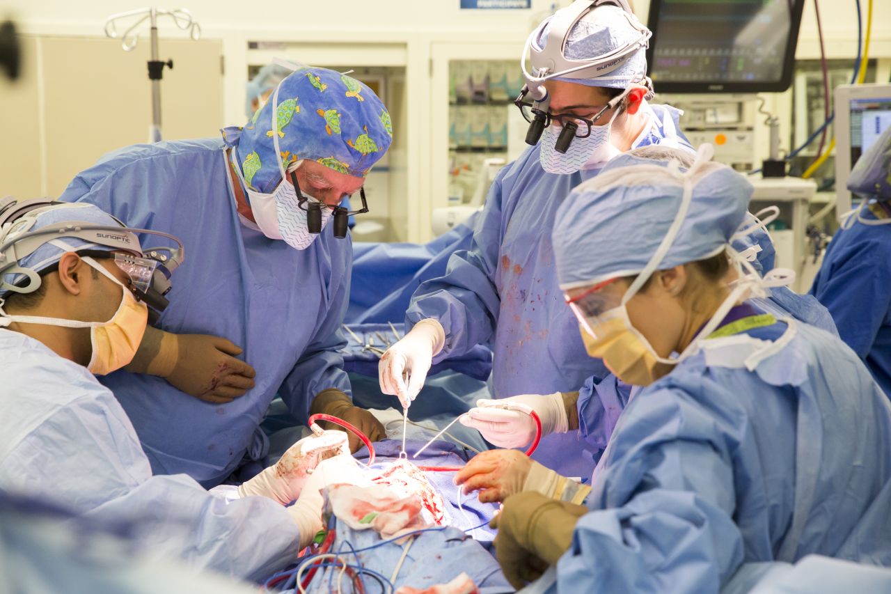 Dr. James Goodrich Goodrich, left, leads a surgical team as they prepared to separate the twins. "Failure is not an option," Goodrich told the team as they got started.