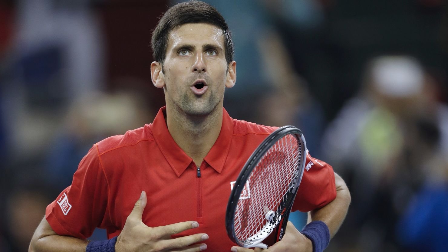 Novak Djokovic celebrates after defeating Mischa Zverev at the Shanghai Masters.
