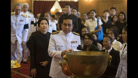 Thai Prime Minister General Prayuth Chan-o-cha attends a traditional funeral bathing ceremony for the King at the Grand Palace in Bangkok on Friday.