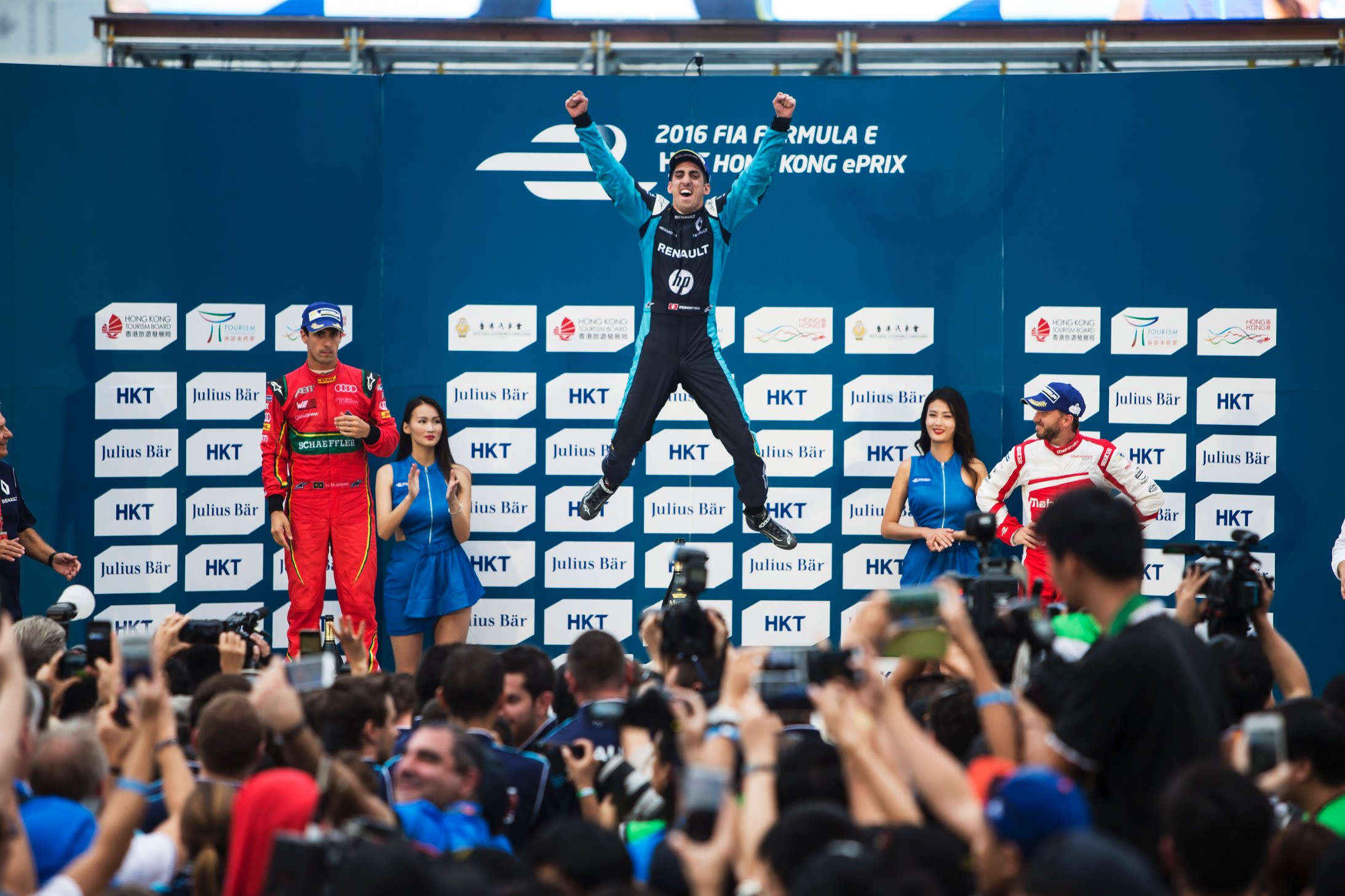 Sebastien Buemi (center) took the checkered flag, to begin his 2016 title defense in style. ABT Schaeffler Audi Sport driver Lucas di Grassi (left) finished second with Mahindra Racing's Nick Heidfeld (right) taking the final podium spot.