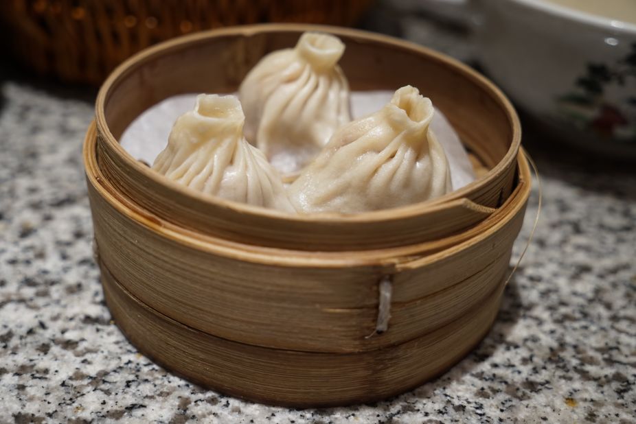 Bits of subtly sweet roasted duck skin are embedded in duck meat for this xiaolongbao spinoff.