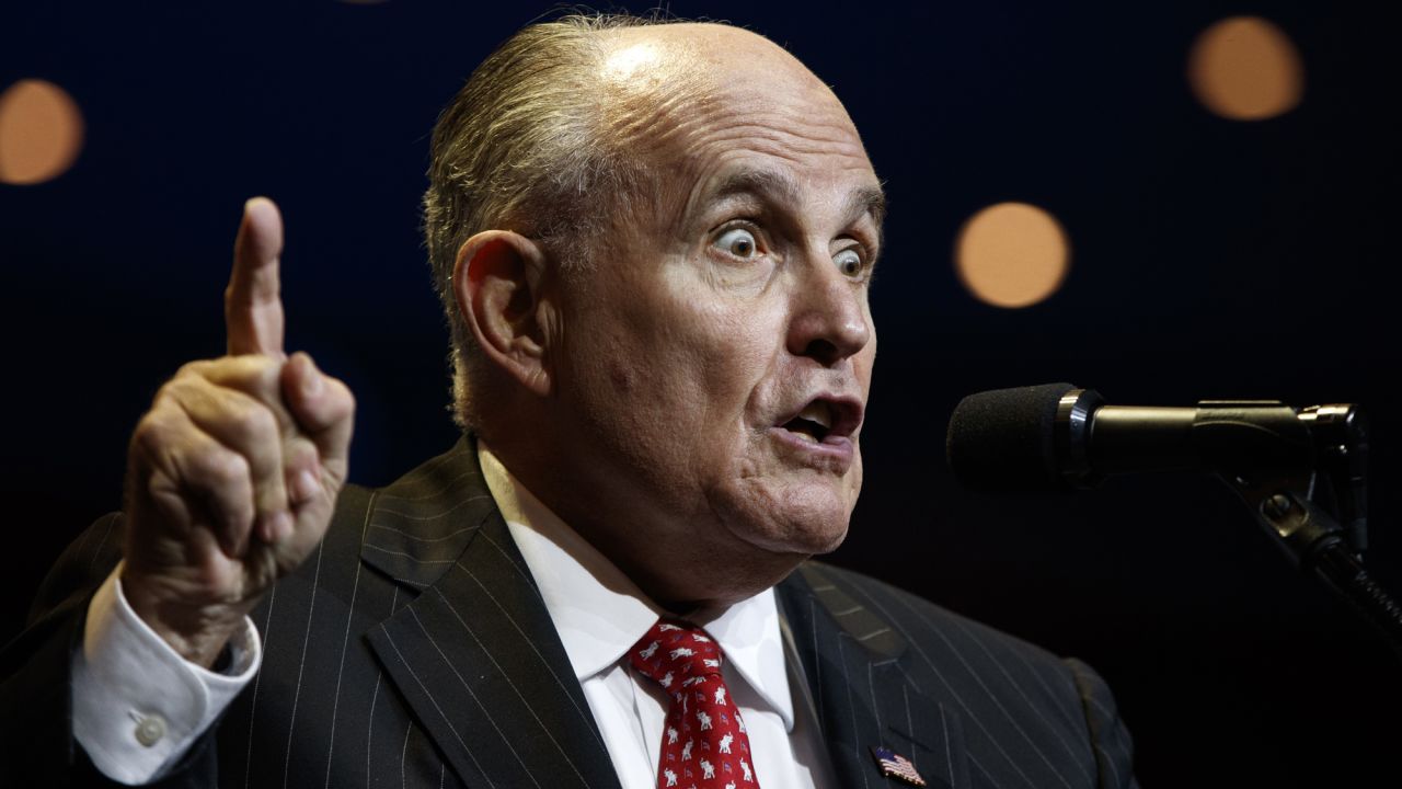 Former New York Mayor Rudy Giuliani introduces Donald Trump, the Republican presidential nominee, at a campaign rally in Cincinnati, Ohio, on Thursday, October 13. 
