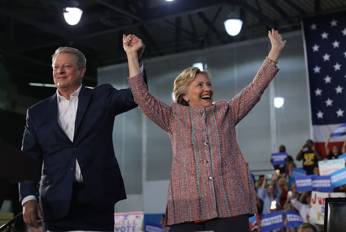Democratic presidential nominee Hillary Clinton, right, attends a campaign rally with former Vice President Al Gore in Miami on Tuesday, October 11. The two focused on <a href="http://www.cnn.com/2016/10/11/politics/hillary-clinton-al-gore-climate-change-2016-election/" target="_blank">climate change</a>, with Gore assuring the crowd that Clinton "will make solving the climate crisis a top national priority."