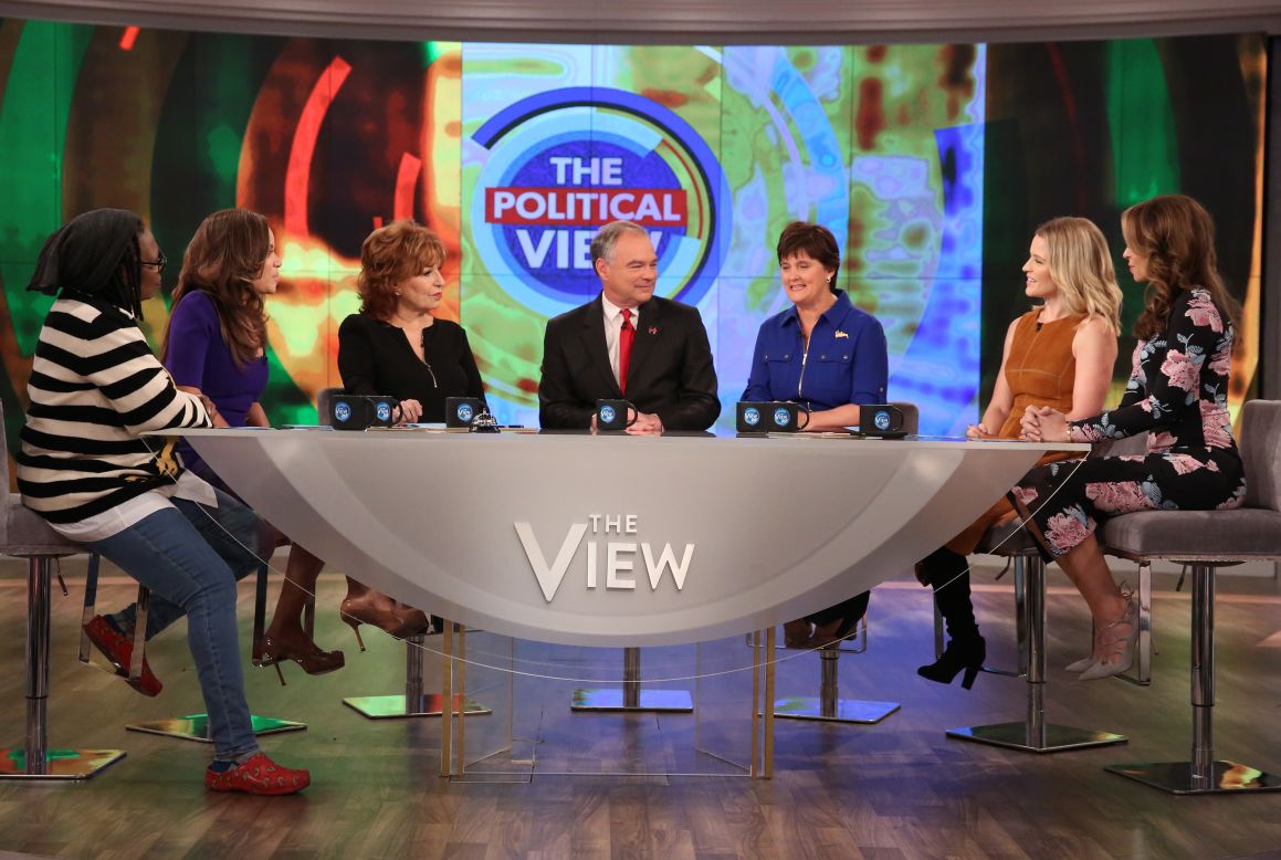 Democratic vice presidential nominee Tim Kaine, center, appears with his wife Anne Holton, third from right, on the television show "The View" in New York on Thursday, October 13.